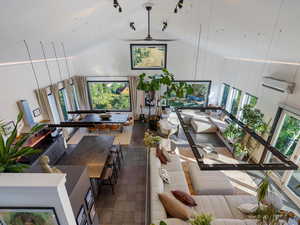Lobby featuring high vaulted ceiling