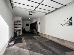 Garage featuring a garage door opener