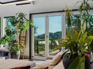 Entryway featuring an AC wall unit