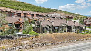 Aerial view of residential area featuring mountains