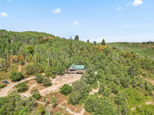 Aerial view of property and surrounding 10.57 acres