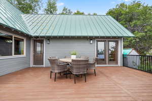 Large brand new TREX deck featuring outdoor dining space and incredible views of Summit County