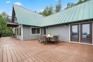 Large brand new TREX deck with outdoor dining area