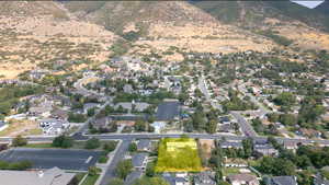 View of property location with nearby suburban area and mountains