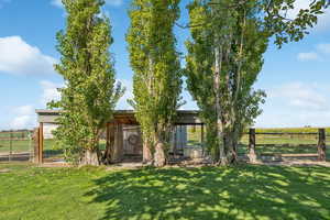 View of green lawn with an outdoor structure