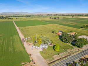 Aerial overview of property's location with extensive farmland and rural landscape