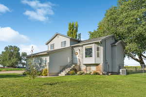 View of front of property featuring brick siding