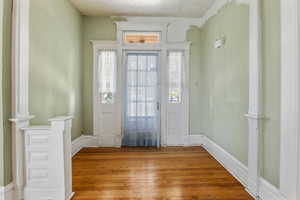 Entryway featuring hardwood / wood-style floors
