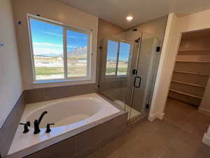 PRIMARY SUITE BATHROOM W/ SEPERATE TUB & SHOWER!