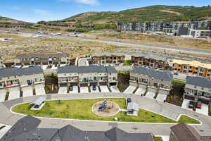 Aerial view of residential area featuring mountains