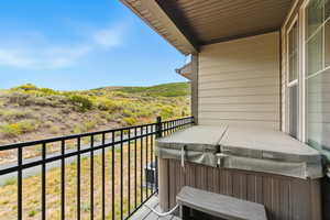Balcony featuring a hot tub
