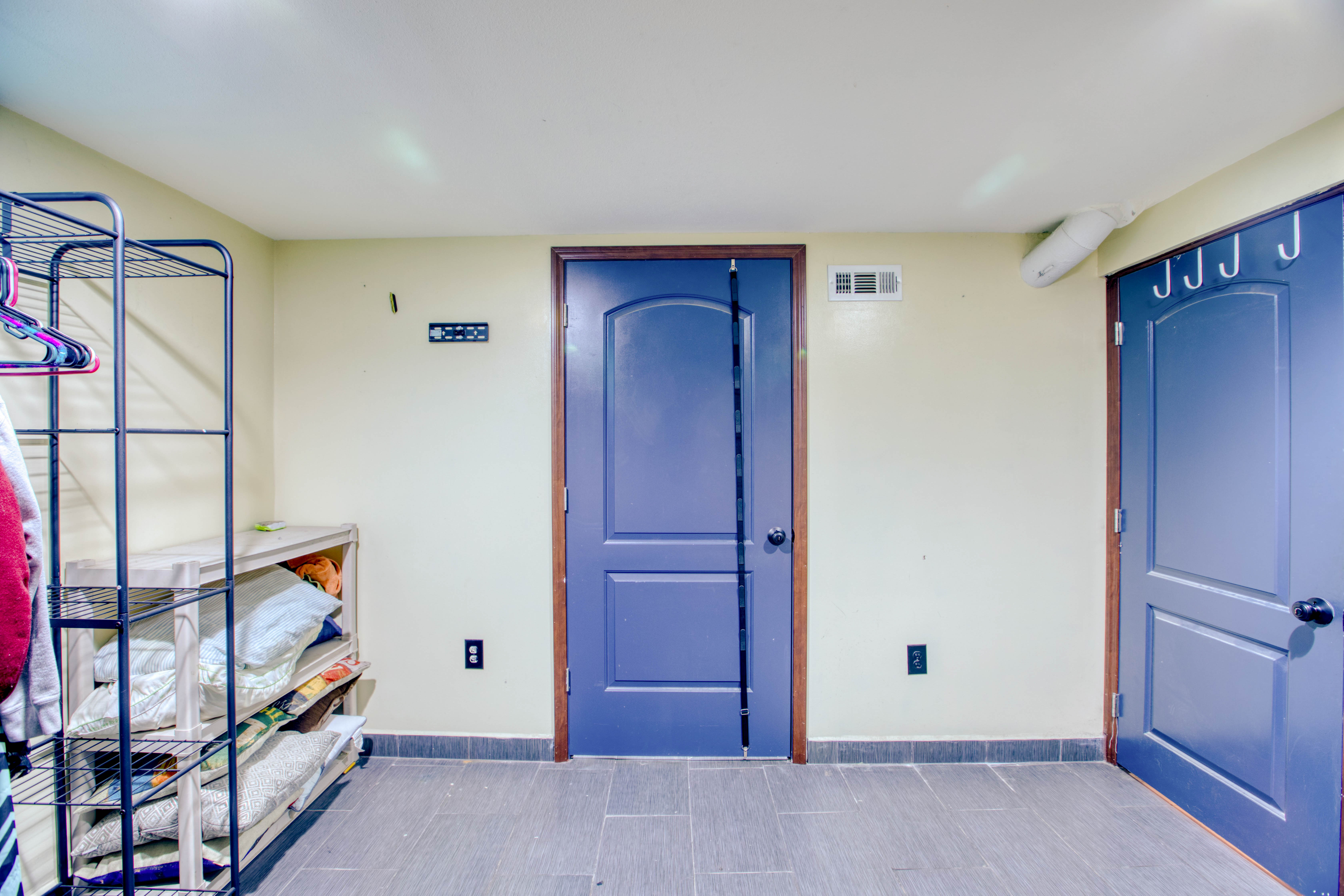 Property entrance with stucco siding