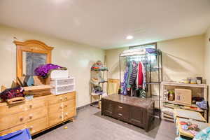 Bedroom with baseboards and recessed lighting