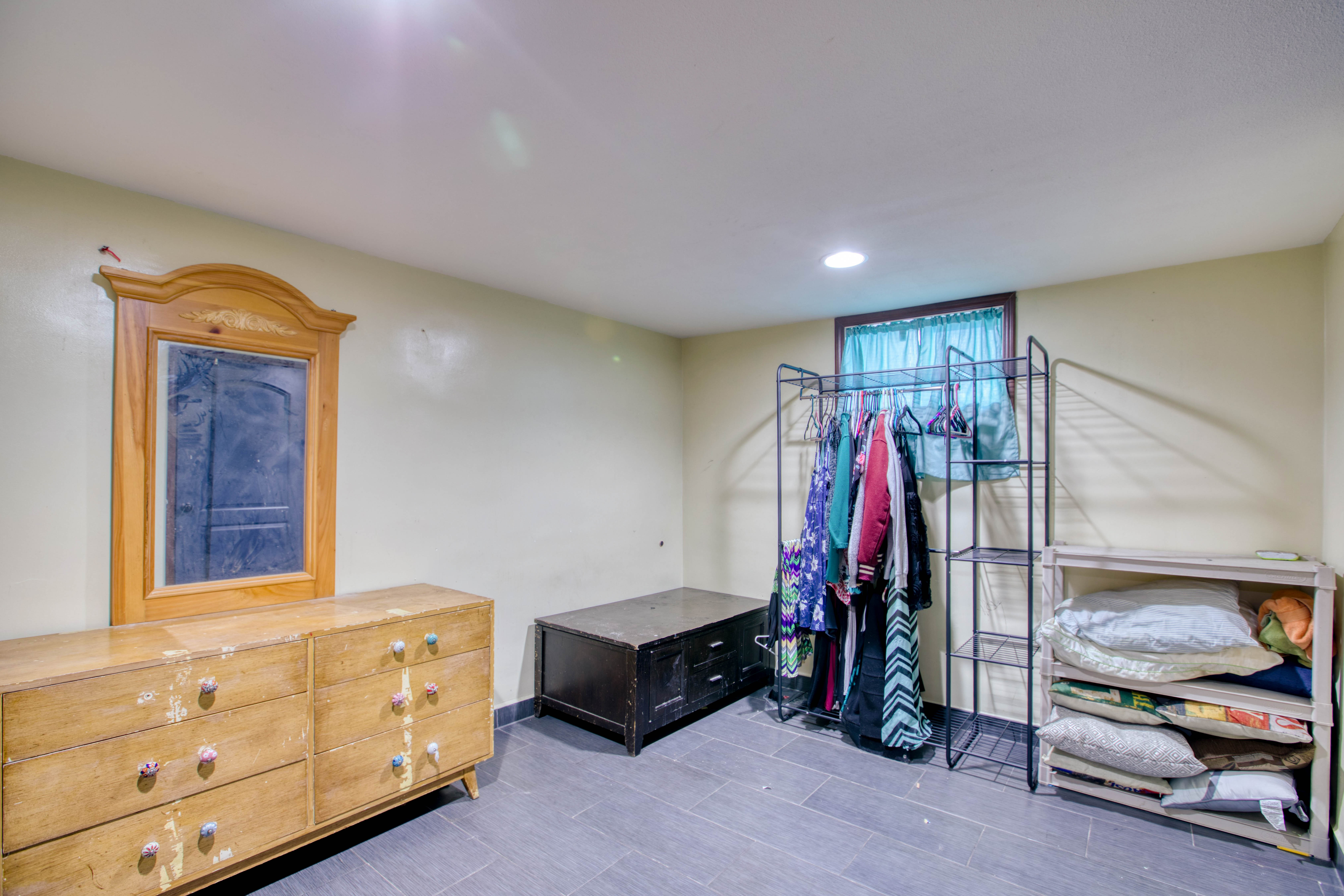 Bedroom featuring recessed lighting and baseboards