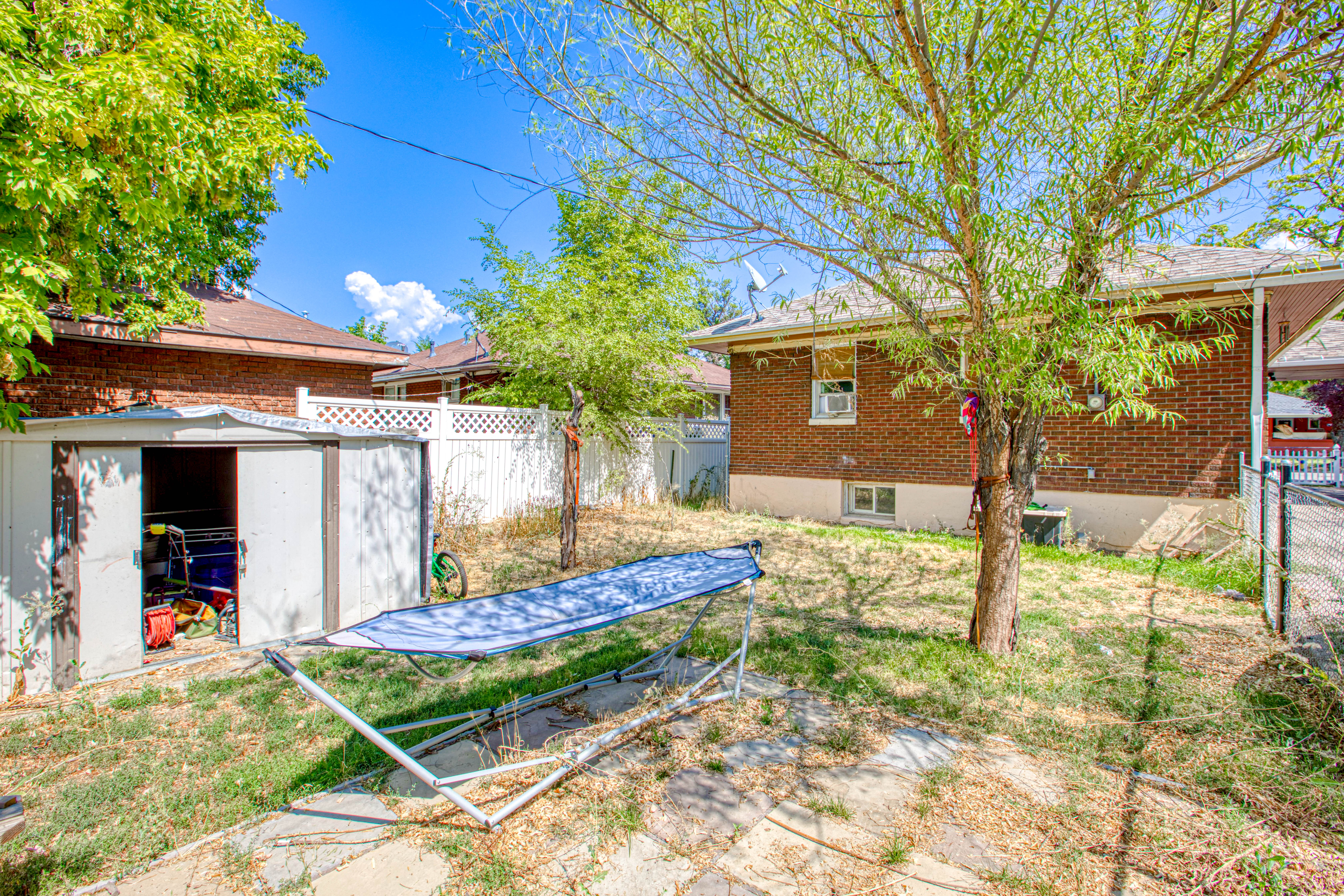 View of yard with a shed