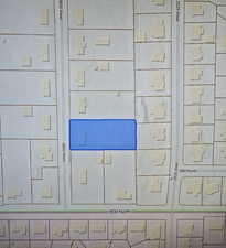 The end of the property line is the large tree that is against the white fence that you'll on the property.