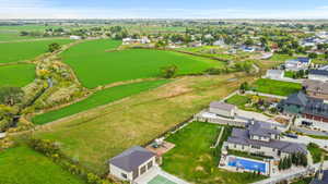 Aerial view of sparsely populated area featuring a pool area