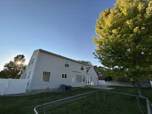 Back of house featuring a fenced backyard