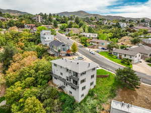 Aerial view of residential area with a mountain backdrop