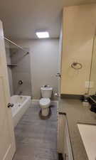 Full bath featuring bathtub / shower combination, vanity, linen closet