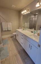 Master bathroom featuring double vanity