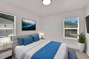 Bedroom featuring baseboards and carpet flooring