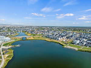 View of property location featuring nearby suburban area and a nearby body of water