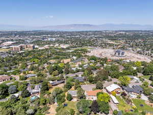 View of property location with a mountain backdrop and nearby suburban area