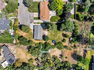 Aerial view of property's location with nearby suburban area