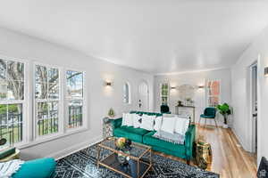 Living room featuring wood finished floors and baseboards