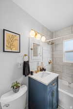 Bathroom featuring vanity and tub / shower combination