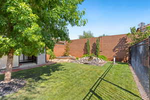 View of fenced backyard