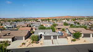 Aerial view of residential area with a mountainous background