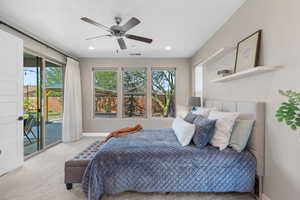 Bedroom featuring access to outside, carpet flooring, recessed lighting, and a ceiling fan