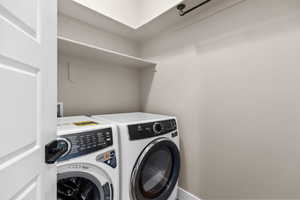 Laundry area featuring washing machine and dryer
