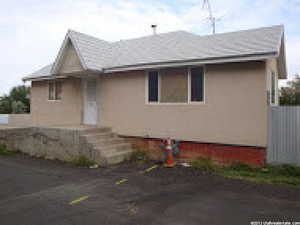 View of front of home with stucco siding
