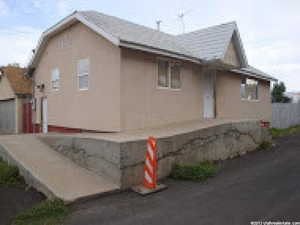View of side of property with stucco siding