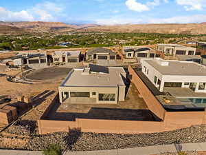 Aerial perspective of suburban area with mountains
