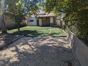 Fenced backyard featuring a patio area