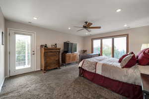 Carpeted bedroom with multiple windows, access to outside, ceiling fan, and recessed lighting