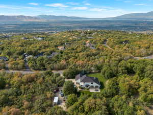 View of property location featuring a forest and mountains