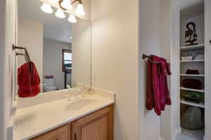 Bathroom with vanity and toilet