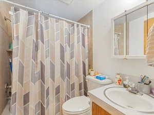 4-plex unit bathroom featuring vanity and shower/tub combo