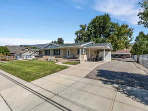 Duplex building exterior view & driveway back to 4-plex building