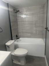 Bathroom featuring shower / tub combination and vanity