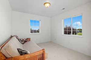 Bedroom 2 featuring carpet and baseboards