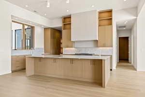 Gorgeous Kitchen with Taj Mahal Counters and 11' Island