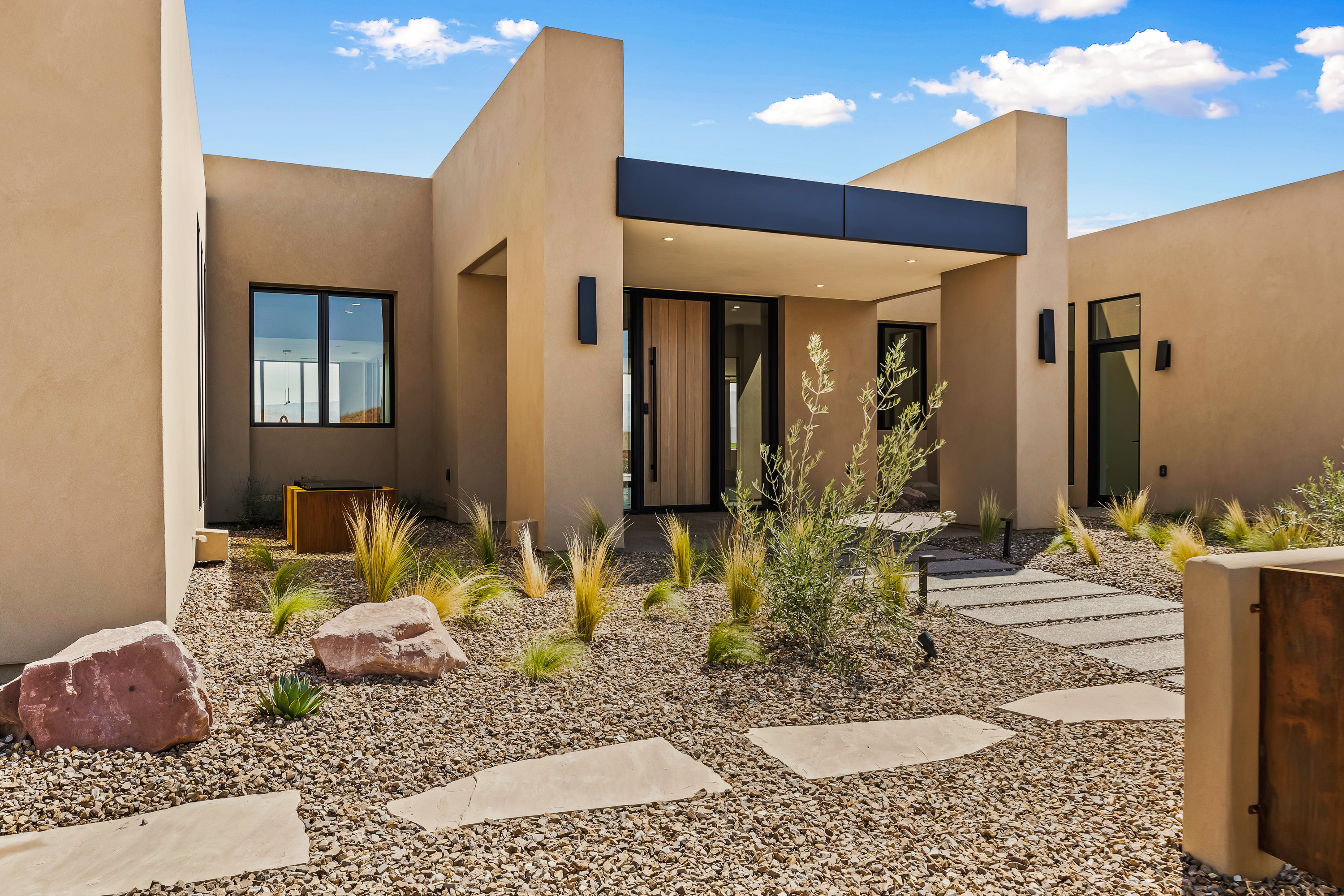 Large Covered Foyer with Casita on Right and Fountain on Left