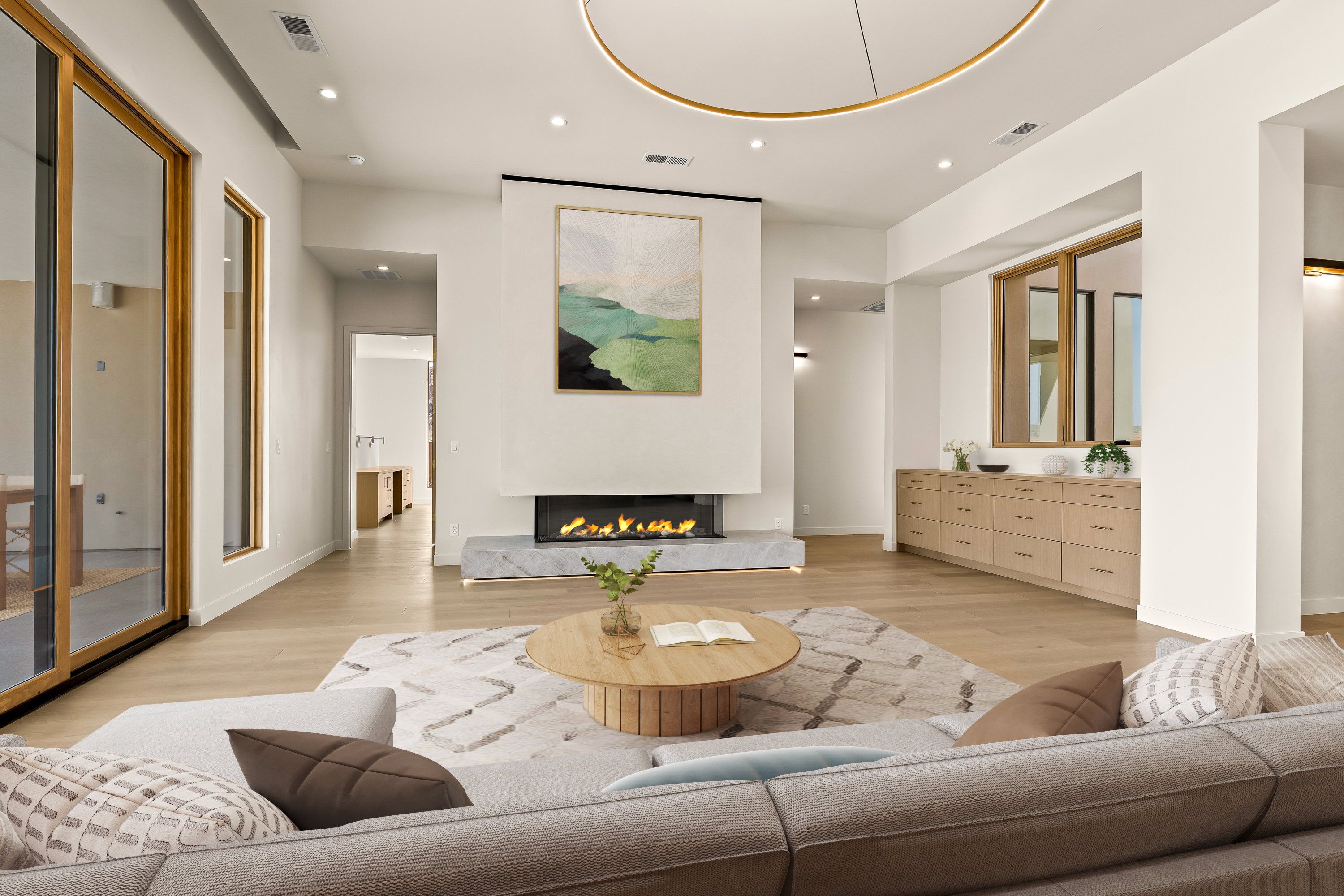 Custom 3-Sided Gas Fireplace with Textured Plaster Surround, and Custom Slab Hearth