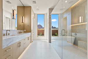 Dual Sinks, Vanity Area, & His & Hers Toilets in Primary Bath